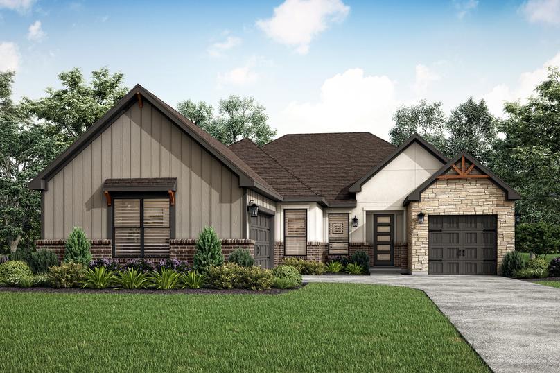 The Liberty is a stunning, single-story home with light stucco, brick and gray siding.