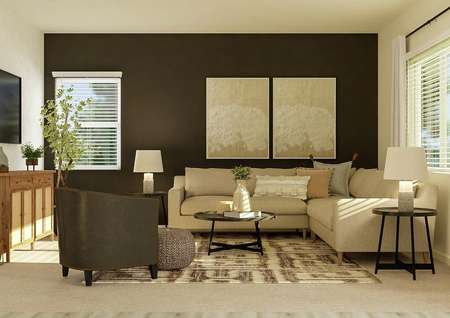 Rendering of the spacious living room
  with two windows, carpeted flooring, two tan walls and a dark accent wall.
  The space is furnished with a cream sectional couch, black coffee and side
  tables, black leather armchair and a mounted tv.