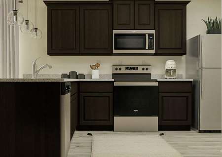 Rendering of the kitchen in the Arapaho
  with dark brown cabinetry, stainless steel appliances and light wood style
  flooring.