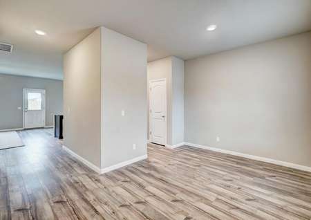 The home's entrance stands out with luxury vinyl plank flooring.