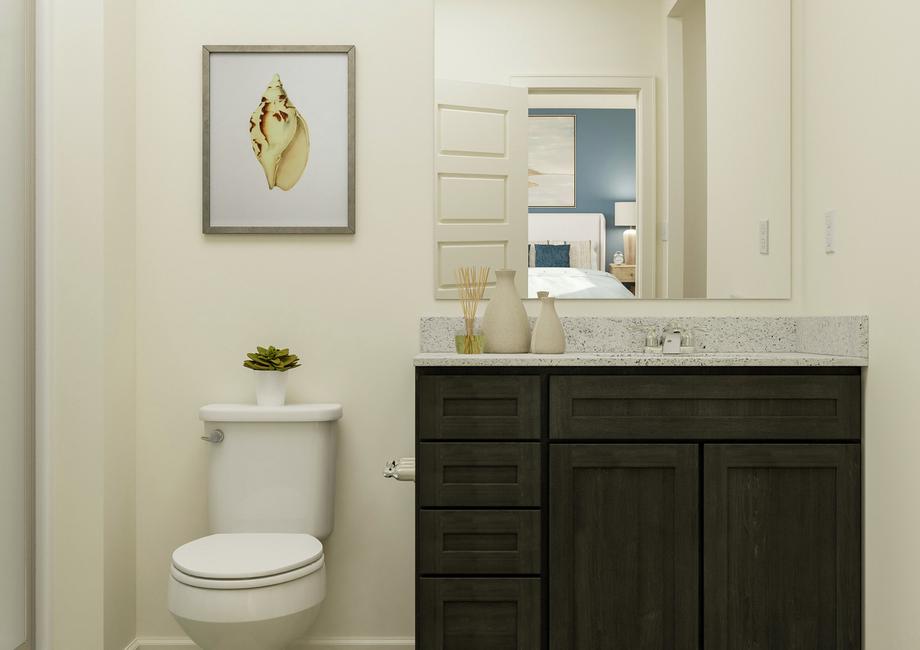 Rendering of the master bath focused on
  the brown-cabinet vanity and toilet. The attached bedroom is visible in the
  mirror.