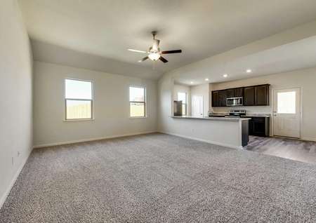 The Reed has an open family room complete with a ceiling fan.