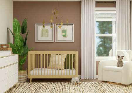 Rendering of a bedroom furnished as a
  nursery with a dresser, crib, star mobile and cream armchair. 