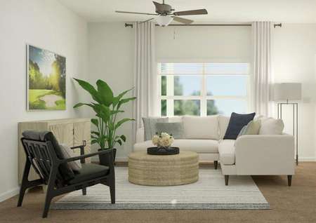 Rendering of the living room, which has
  carpeted flooring and a large window. The space is furnished with a
  sectional, round coffee table and accent chair.