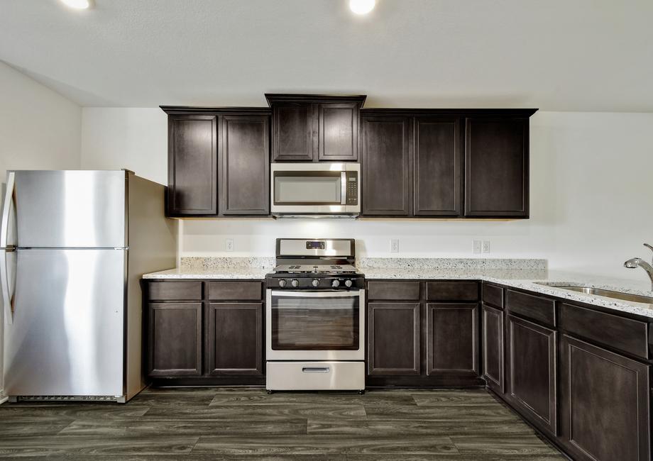Fall in love with cooking in your brand-new kitchen filled with new stainless steel appliances.