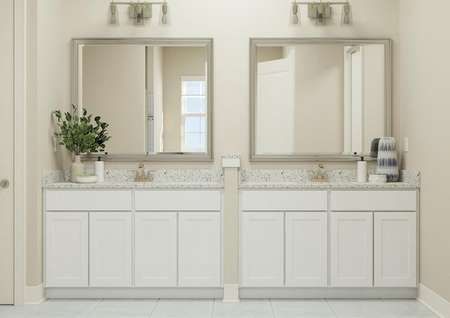 Rendering of master bath showing an
  expansive double sink vanity with white cabinetry and decorative lighting
  with tile flooring.