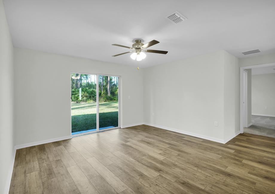 The family room's sliding doors makes it easy to enjoy the Florida weather