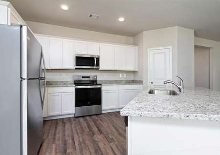 Other kitchen upgrades include an undermount sink and a full suite of stainless appliances.