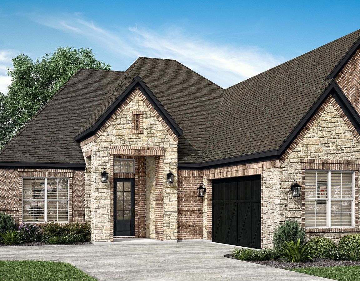 The Hanna plan is an incredible home with a brick exterior and side-entry garage.