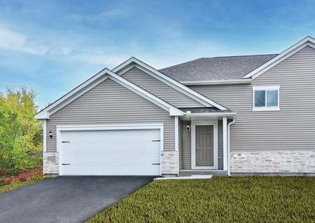 Exterior photo of one half of the Grant twinhome with light gray siding and white trim and an asphalt driveway.