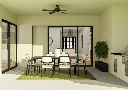 Rendering showing the Fairview floor
  plan's covered patio with built-in grill and wet bar. A table, chairs,  outdoor rug and potted plants decorate the inviting space.
