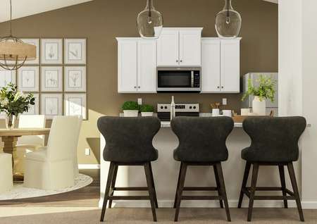 Rendering showing the kitchen with
  breakfast bar adjacent to the dining room.