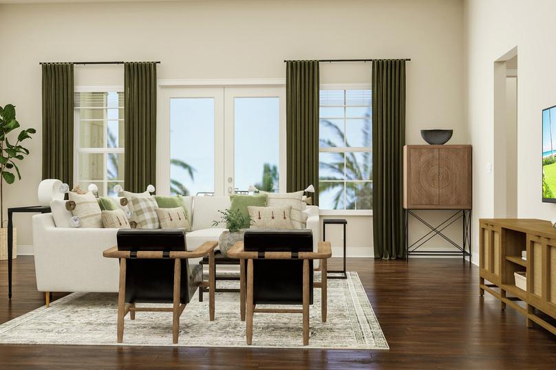 Rendering of living area showing white
  sectional couch, black accent chairs, and media cabinet with tv and dark wood
  look flooring throughout.
