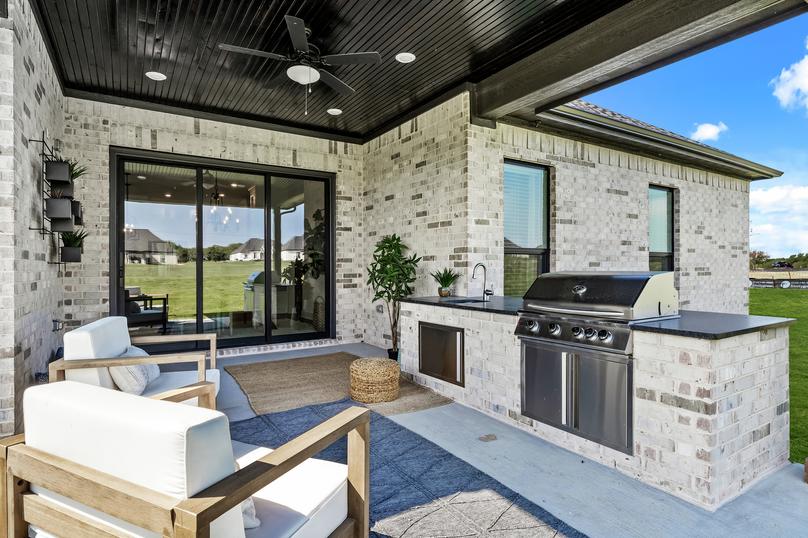 Outdoor kitchen is the perfect space for grilling out on the weekends.