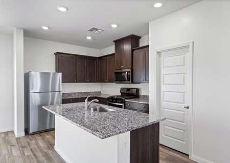 Kitchen with stainless steel appliances and granite countertops