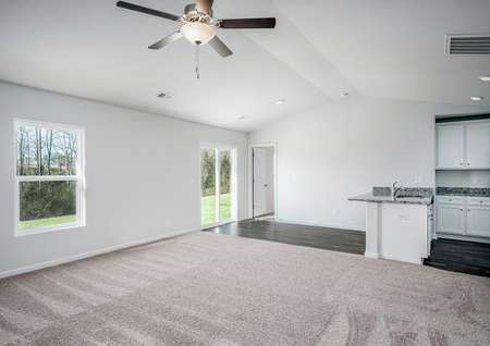 Open floor plan with a large living room off the breakfast area and kitchen.