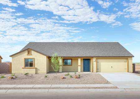 Willow completed home street view with desert landscaping, single living level, and light colored siding