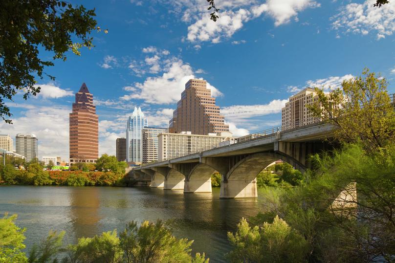Austin, Texas townlake and Congress Avenue Bridge featuring the city