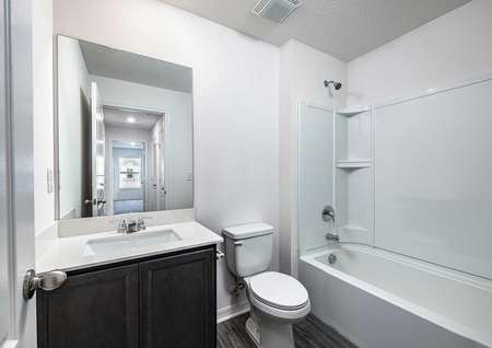 Spare bathroom on the second floor with a sink, toilet and shower/bathtub.