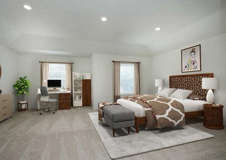 Spacious, decorated master bedroom with two windows, carpet, bed, dresser, desk and shelf, recessed lighting.