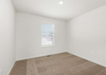 The guest bedroom is spacious
