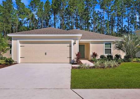 Beautiful, single-story floor plan with a long driveway, two-car garage and gorgeous front yard landscaping. 