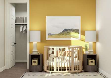 Rendering of a secondary bedroom
  converted into a nursery featuring a crib and two nightstands along a yellow
  accent wall. A walk-in closet is to the left. 