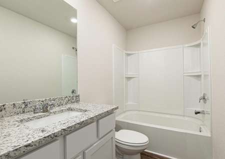 The spare bathroom has a large vanity ready for your guests