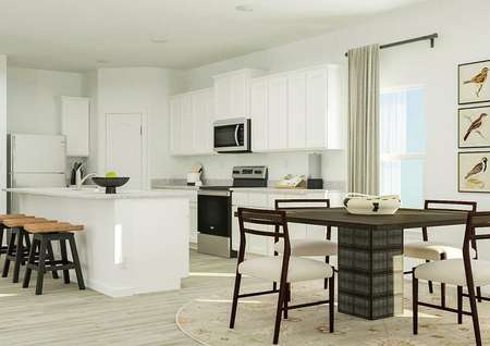 Rendering showing the dining area in
  front of the spacious kitchen.