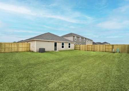 Outdoor entertainment is made easy with this home's fenced-in back yard. 
