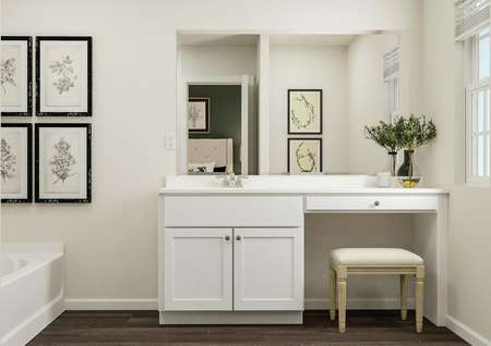 Rendering of the spacious master bath
  focused on the white-cabinet vanity. Beside the vanity is the tub with
  artwork hanging above it. 