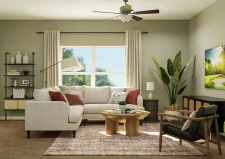 Rendering of the living room with large
  window in background and sectional seating, and round coffee table.