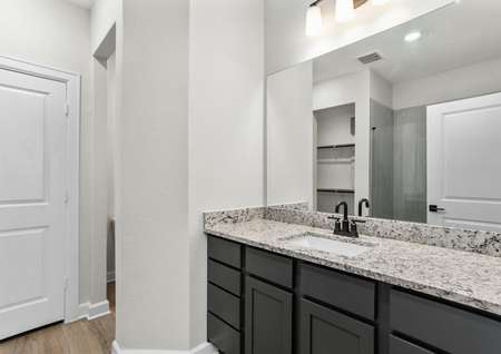 Master bathroom with a large vanity and step in shower