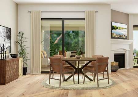 Rendering of the breakfast nook featuring
  a round dining table and four chairs next to sliding glass doors. On the wall
  is a sideboard below a large landscape photograph next to a potted plant.