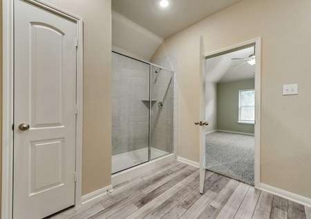 Ontario master bath with walk-in shower and modern flooring