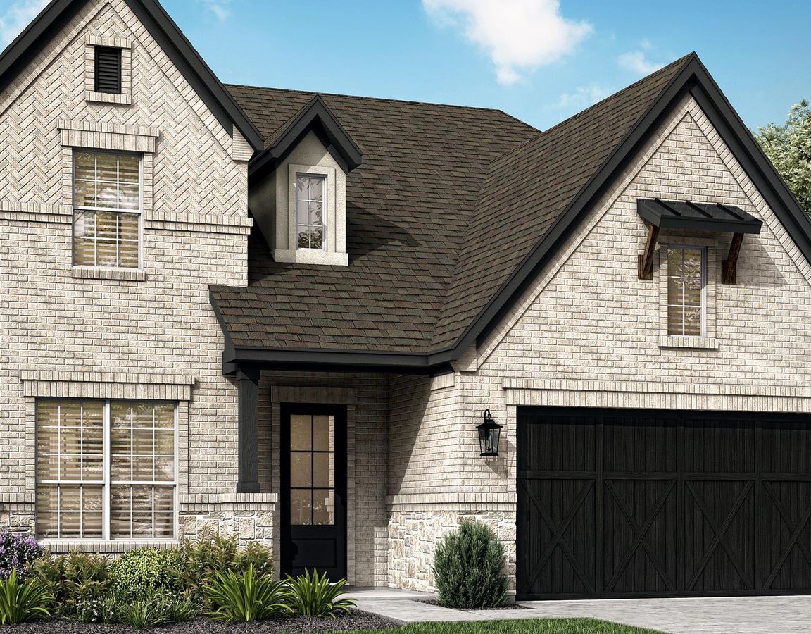 The Jordan plan is a light, brick home with an attached two-car garge.