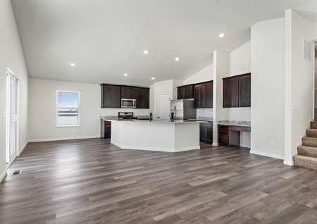 The entertainment space is open-concept and includes the kitchen, dining and family room