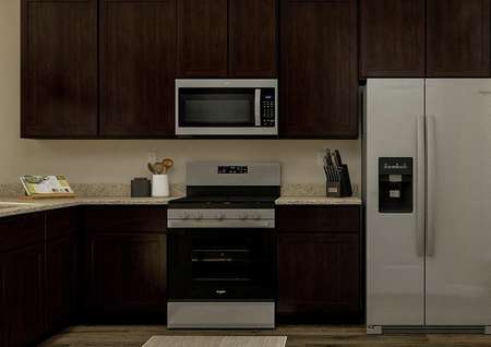 Rendering of the kitchen in the Arapaho
  with dark brown cabinetry, stainless steel appliances and wood style
  flooring.