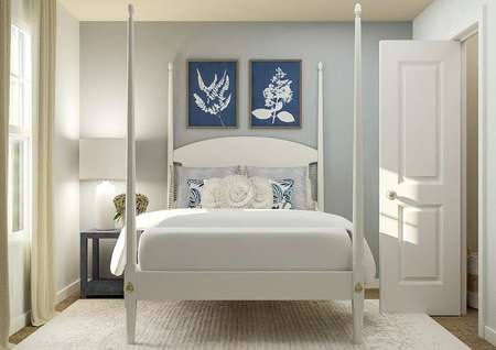 Rendering of a
  secondary bedroom with a window, white poster bed, navy nightstand and the
  doorway to a closet.