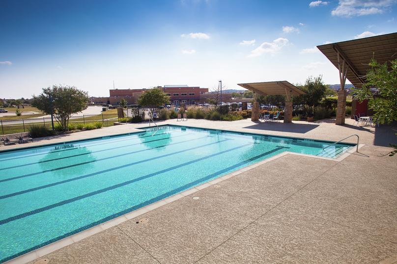 Junior Olympic-sized swimming pool at Blanco Vista community.