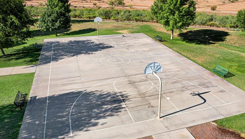 Shoot some hoops on the basketball court with your friends and family. 