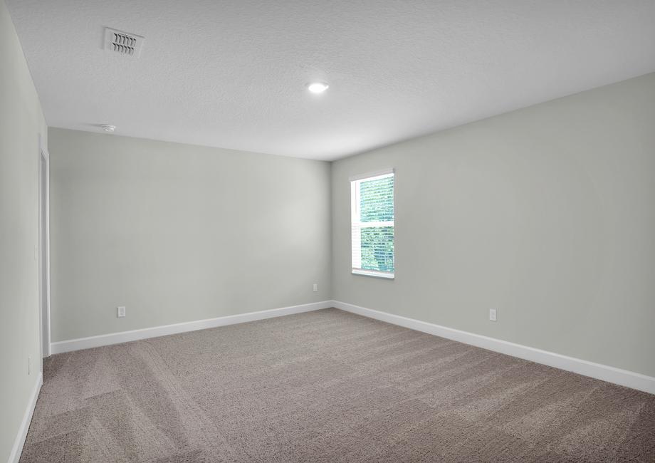 The spare bedroom is spacious with natural lighting, and all of the bedrooms in the Wayside have their own walk in closet