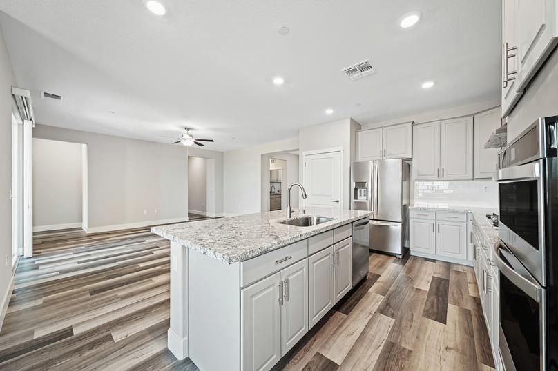 Never miss a beat during your favorite show or carrying on conversation with a kitchen that overlooks the family room.