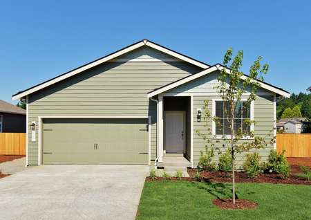 Front elevation photo of the Columbia by LGI Homes, rambler style home in sage green siding.