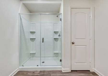 The master bath has a huge enclosed shower.