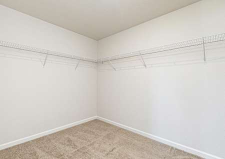 The master bedroom has a large walk in closet ready for your wardrobe