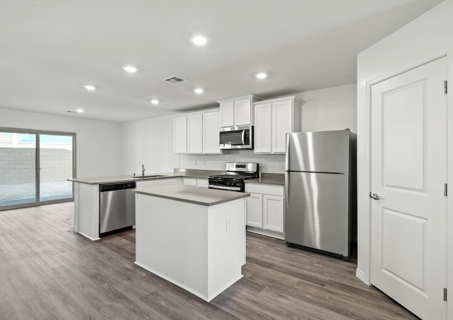 Kitchen with stainless steel appliances and plank flooring