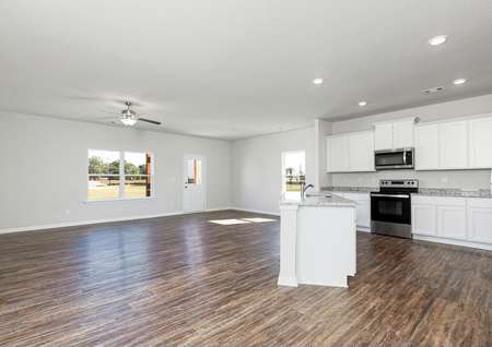 The Allatoona has open entertainment space with a beautiful kitchen island at the heart if the home