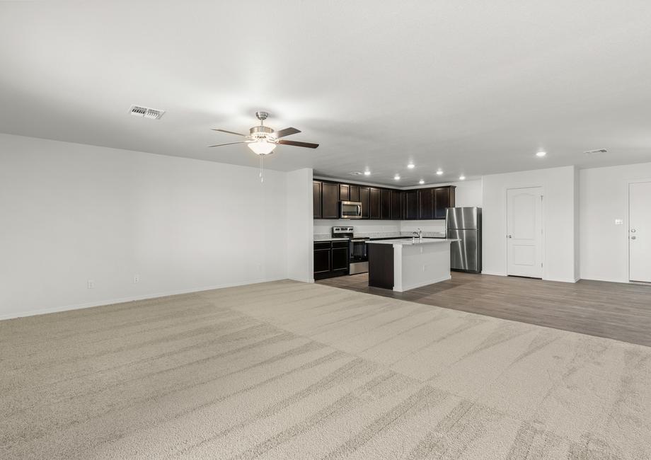 Spacious layout with a large living room connected to the dining area and kitchen.