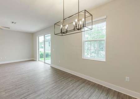 An open family room leading to the rest of the entertainment space.
